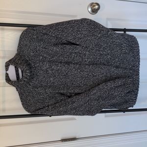 Black and white turtleneck sweater